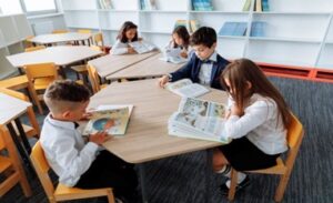 Children reading at a table