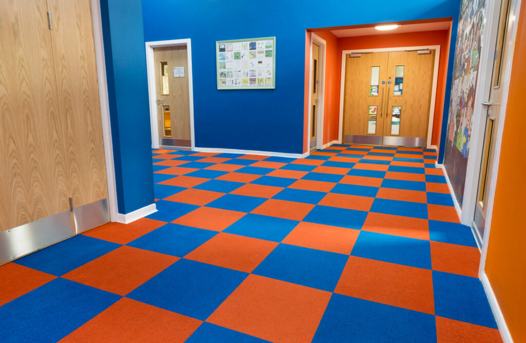 Heckmondwike Supacord Orange and Blue School Carpet