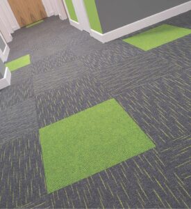 Array tiles in Lime and Broadrib tiles in Willow in an apartment corridor