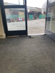 Before picture of the hazardous entrance matting