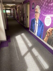 Purple Broadrib borders and Array tiles have been installed in the school's corridors to match the wall designs