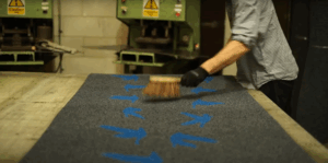 The finished mat, grey background with blue birds