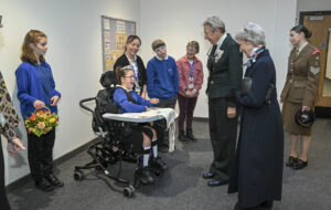 Supacord carpet tiles in a grey colourway installed in SEN classroom, featuring a few children from the school being visited by HRH The Duchess of Gloucester, joined by the Lord Lieutenant of Cambridgeshire, the High Sheriff of Cambridgeshire, and the Mayor of St Neots